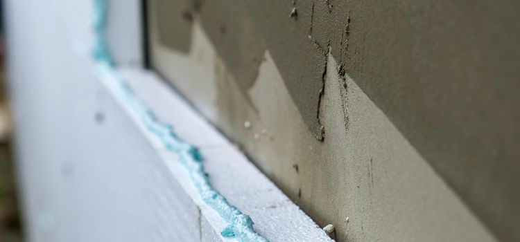 hőszigetelés rendszer rétegrend ragasztás közeli részlet