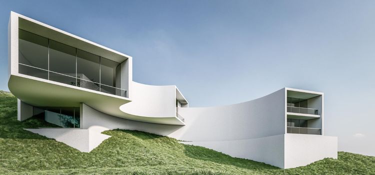 Modern fehér épület íves homlokzat zöld domboldalon - austrotherm homlokzati hőszigetelés bemutatása